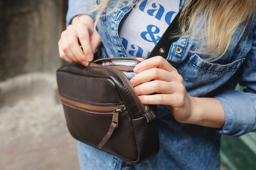 girl with safety purse