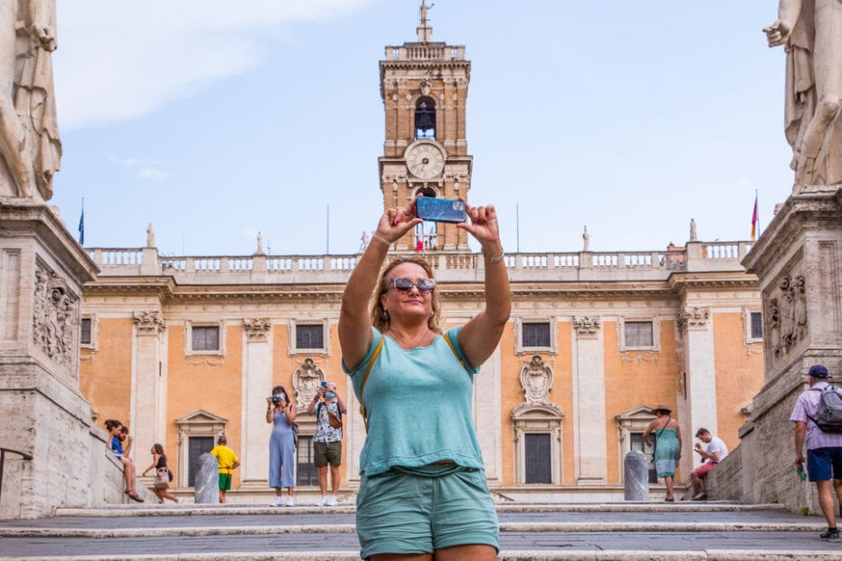 Woman taking photo in Rome